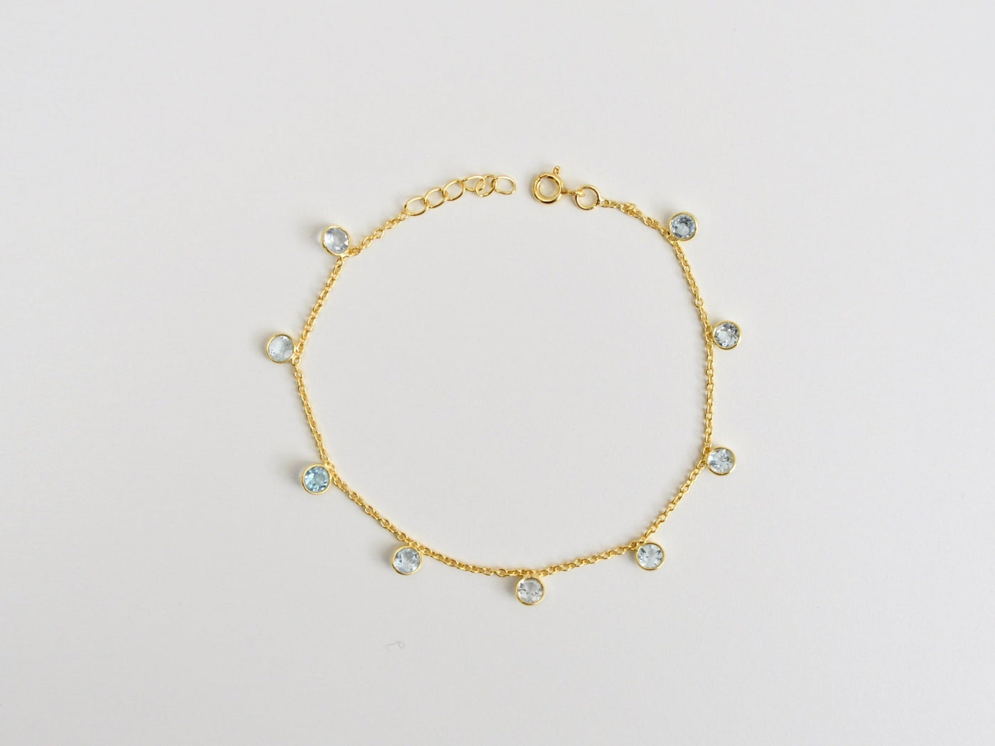 Flying Gemstones: Zartes Armkettchen Blauer Topas | vergoldet, silber